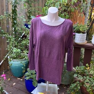 Asymmetrical, long sleeve plum top.